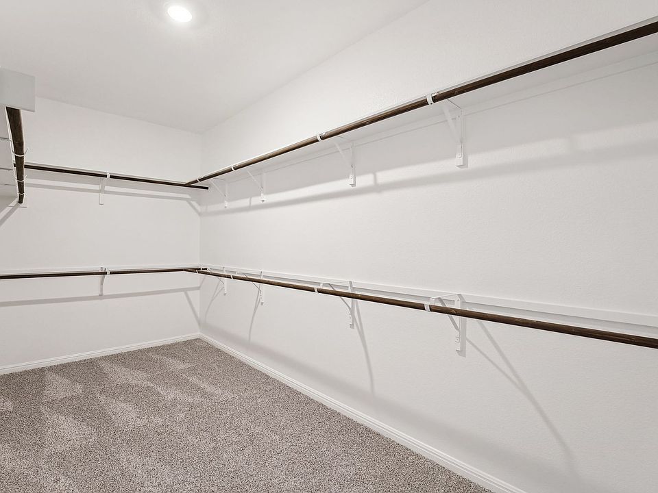 Primary Bedroom Closet in Riverbend at Double Eagle at Meritage Homes in Austin, TX.