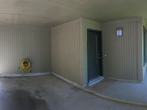 Carport and covered entrance help keep you dry when Kentucky rain is pouring down.
