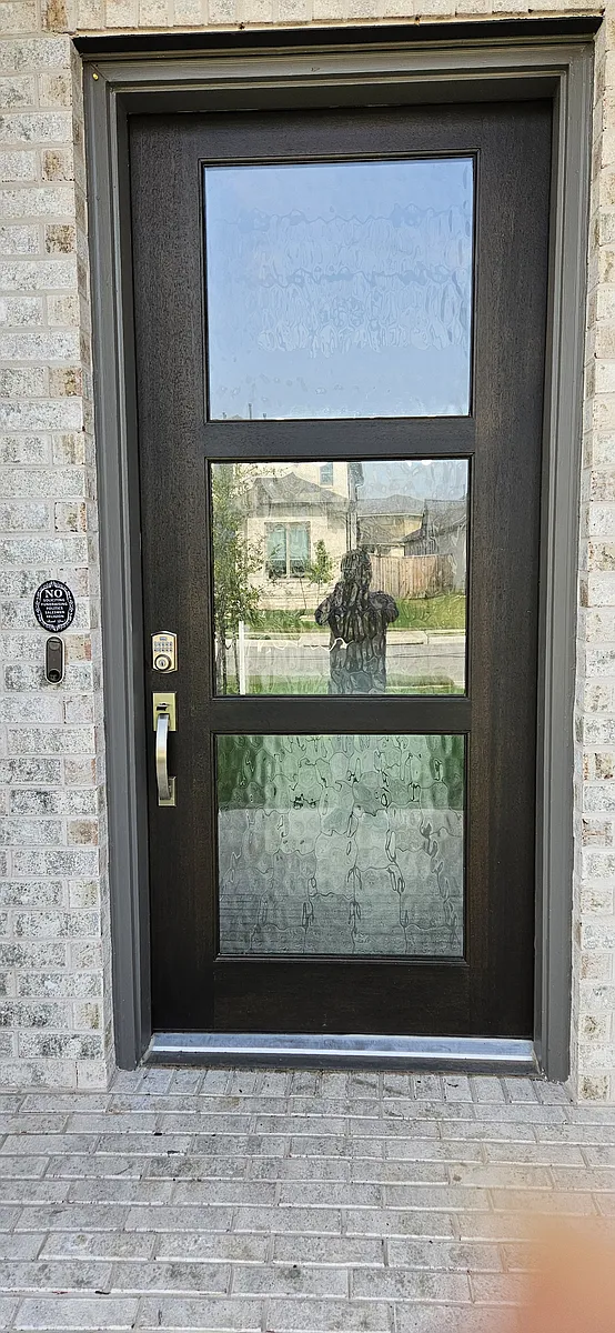 Huge from door with smart bell. - 14704 Kira Ln