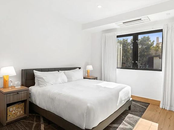 Beds are fully outfitted in luxurious, hotel-grade linens.