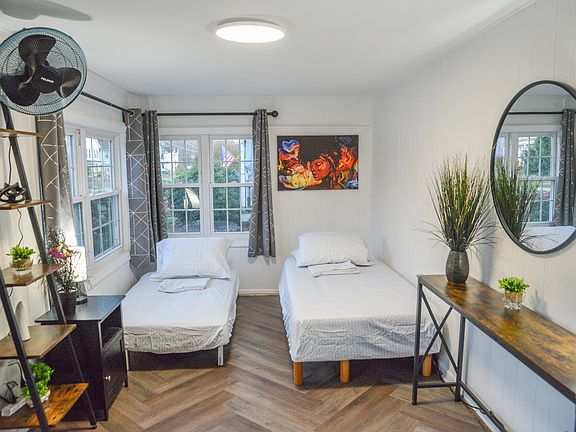Converted sofa beds. Sleeps two. Pillows, blankets, bed linens are stored in bedroom''s 1 closet