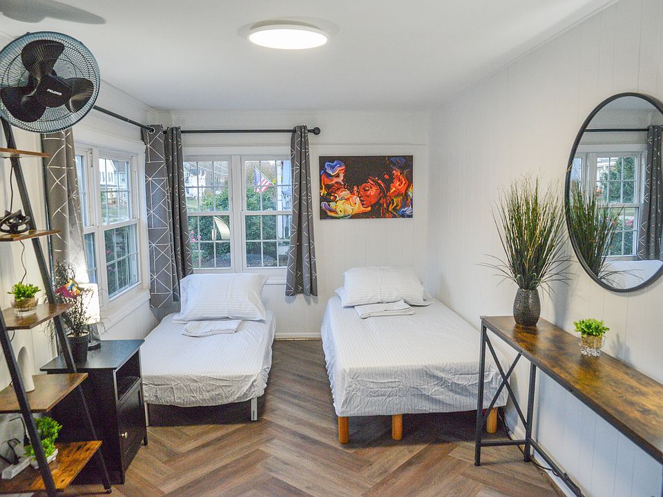 Converted sofa beds. Sleeps two. Pillows, blankets, bed linens are stored in bedroom's 1 closet