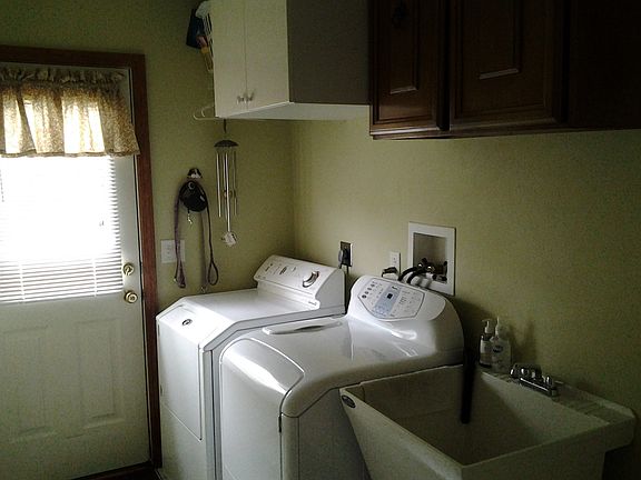 Laundry room with laundry chute from second story