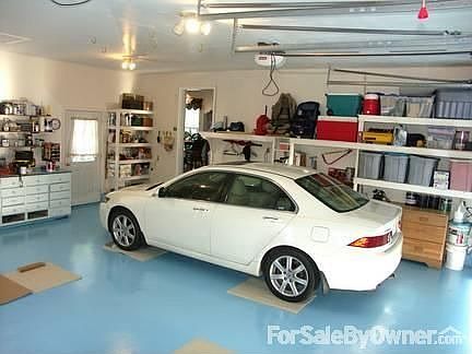 Two Car Garage Oversized : A lot of room in front and back of vehicles. Finished and very clean no m