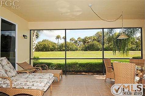 Gorgeous tiled lanai - look at the view!