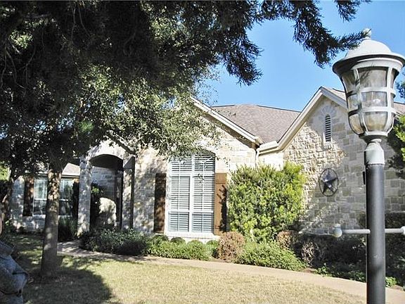 Front of house with private front doorway.