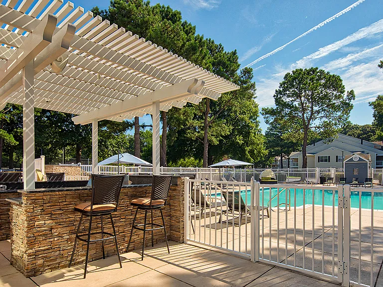 Grill area next to swimming pool