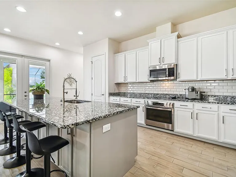 10627 Mistflower Ln — Photo 13