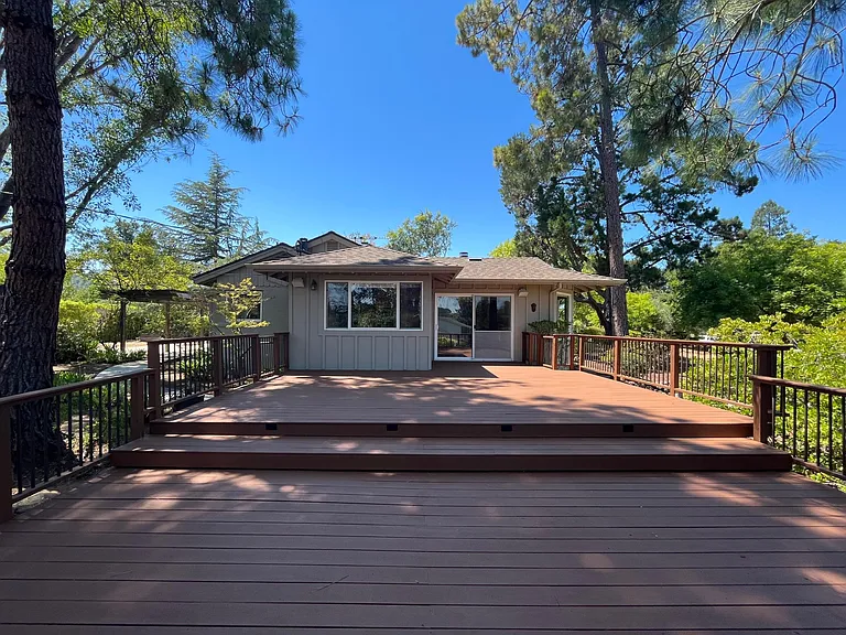 A inviting outdoor deck beckoning for entertainment or relaxation