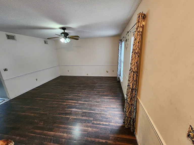 Living room, wood floors.