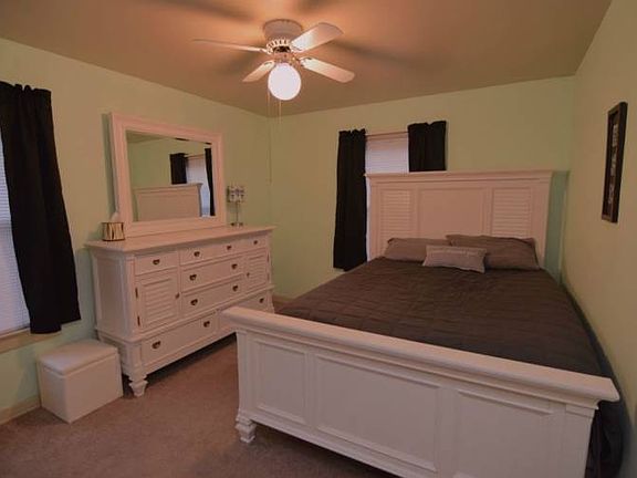 Bedroom has newer carpet, paint, and windows