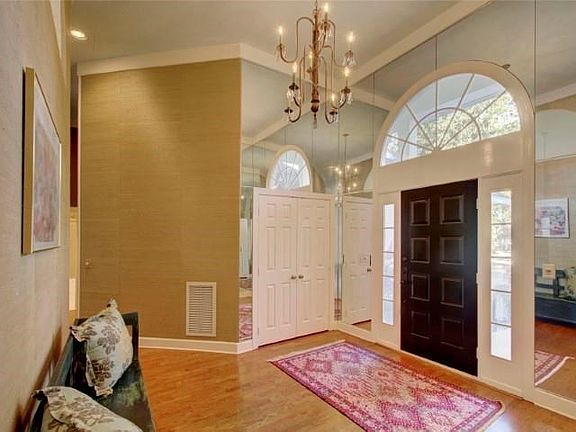 Foyer with vaulted ceiling