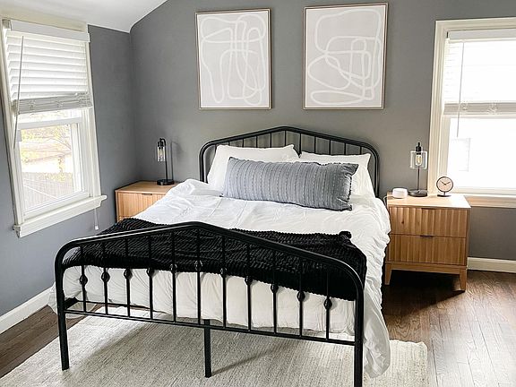 Unwind in our Queen bedroom with ample dresser and closet space.