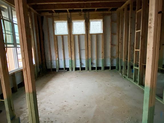 Study quietly nestled in the front of the home - progress photo