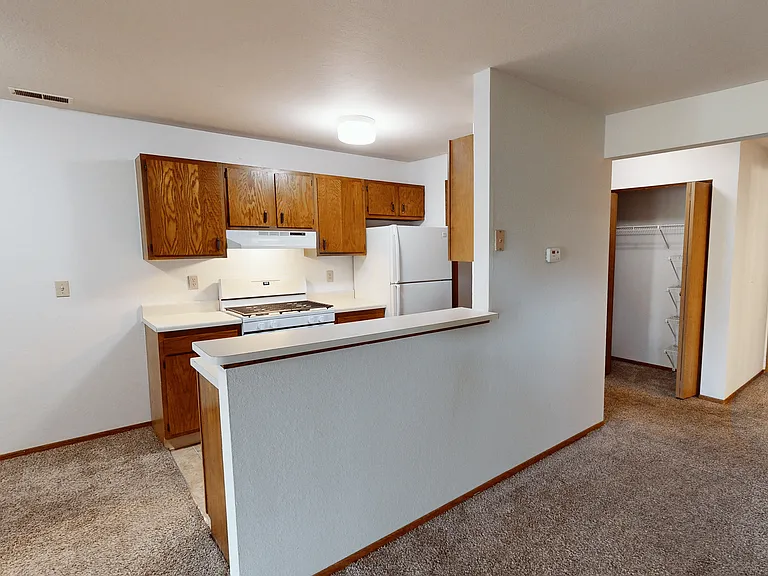 Eat-In Kitchen with Breakfast Bar In Select Homes