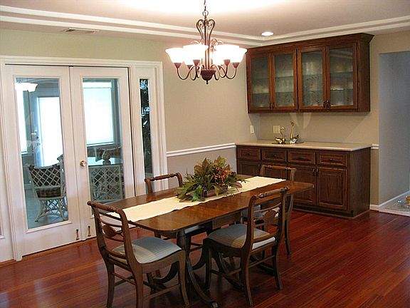 Dining area ready for entertaining. Custom built ins.