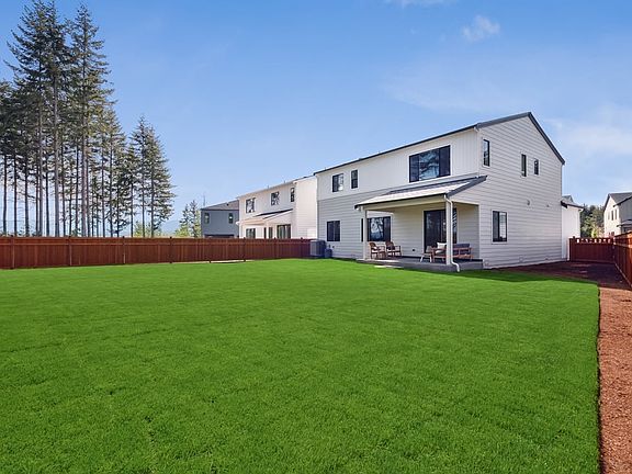 Covered Rear Patio and Fenced Rear Yard