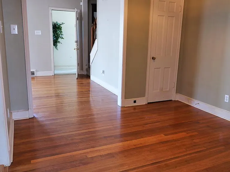 Dining room. Living room in room beyond.