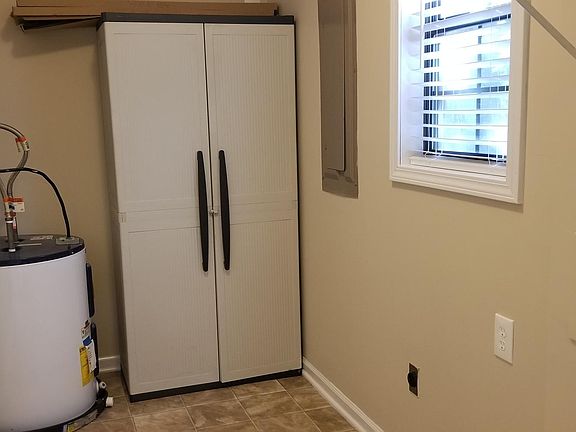 Laundry room with storage
