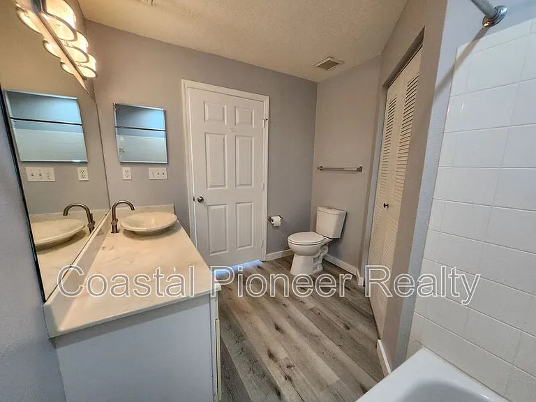 9232 Lake Chase Island Way — Photo 28