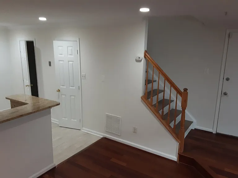 Entrance to Kitchen Area and Main Stairs to Upper Levels