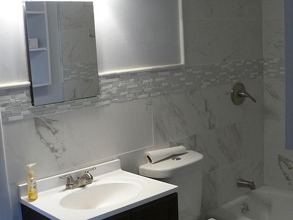 Bath New Tile, Vanity, Tub, Med Cab., Lights