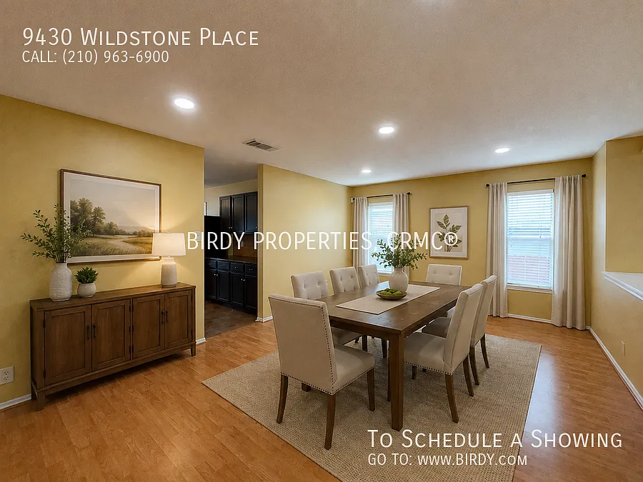 "Spacious 4-Bedroom Sanctuary with Fireplace at 9430 Wildstone Place!" — Photo 4