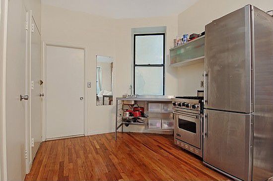 2nd image of 323 E 8th St APT 1C