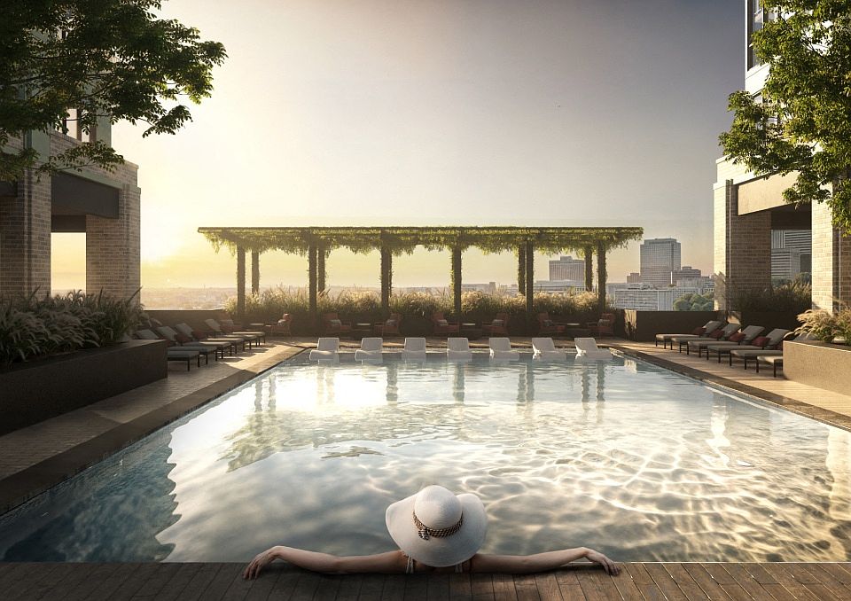 Resort-style pool and cabanas at The Everett Nashville Yards