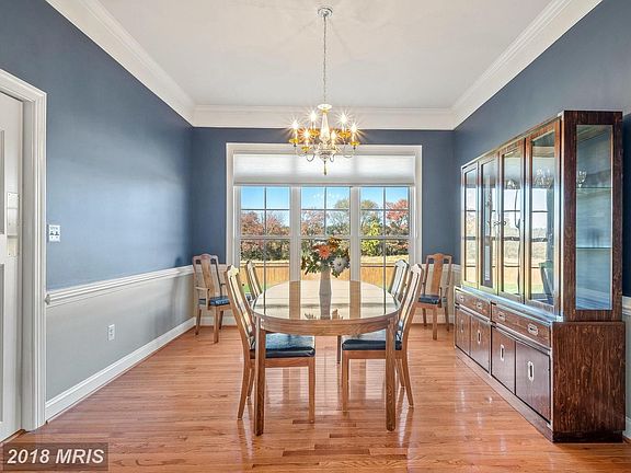 DINING ROOM W/HARDWOOD FLOORS