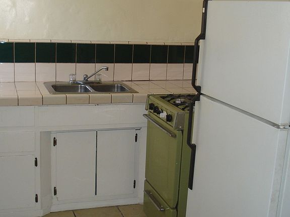 Stove and Refrigerator included