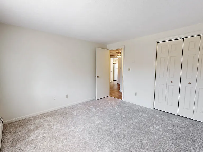 Spacious bedroom with plush carpeting with 2 double closets!