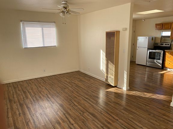 Spacious bedroom with ceiling fan and great ventilation