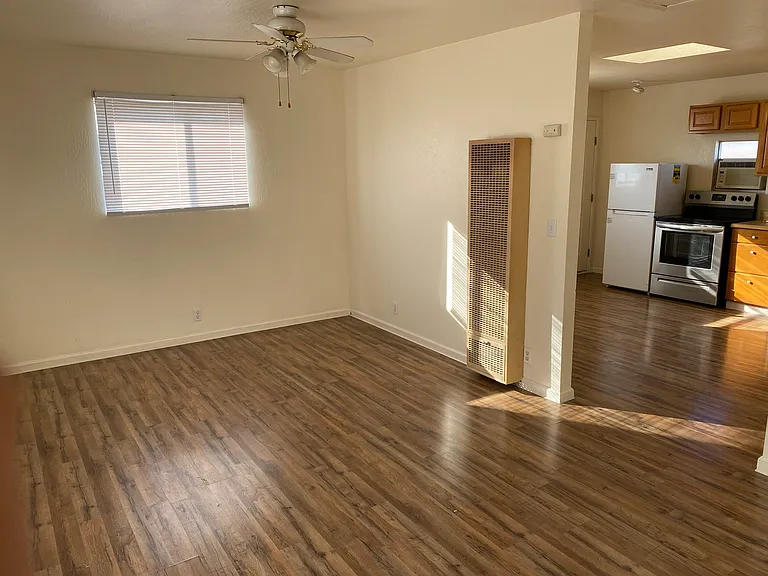 Spacious bedroom with ceiling fan and great ventilation