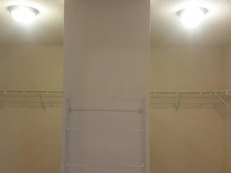 huge his/hers master closet