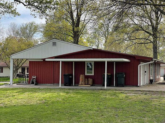 Concrete pad goes all the way to the back patio.