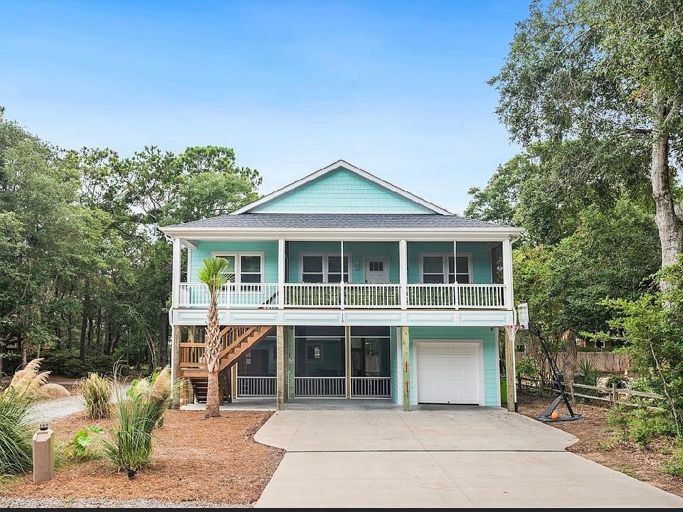 we elevated range with new hot spa & 2-3 mins to to the beach, game room, screened porch