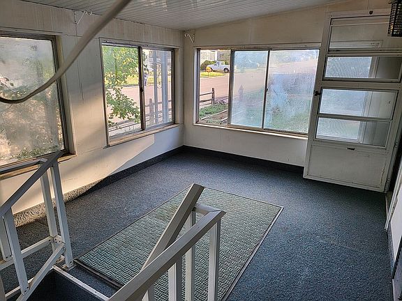 Enclosed front porch