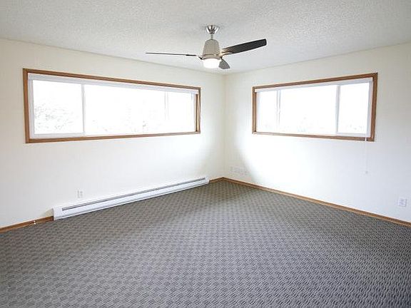 Very large bedroom with lots of natural light