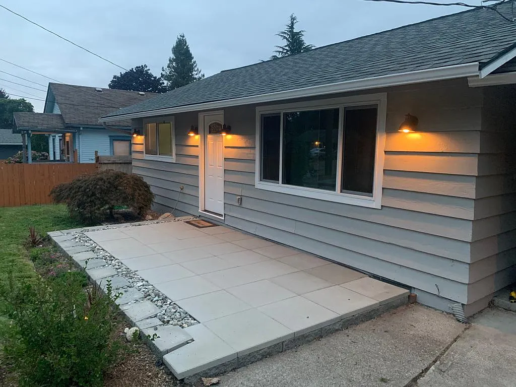 New large patio for front entrance - 21609 54th Ave W