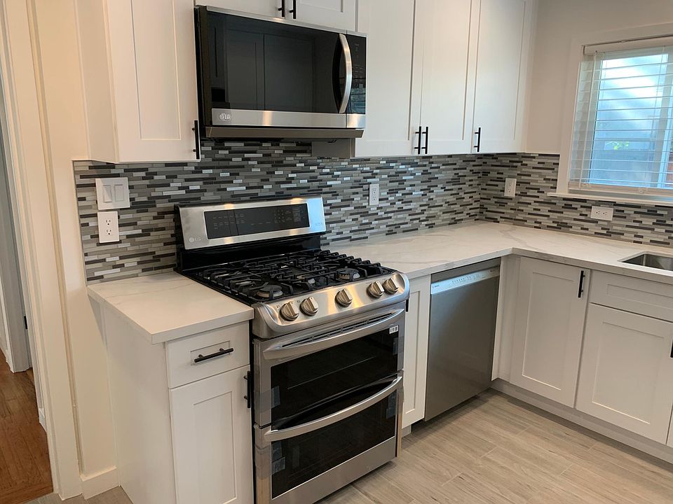 Gas stove, Bosche dishwasher, microwave....cabinets, flooring backsplash all brand new.