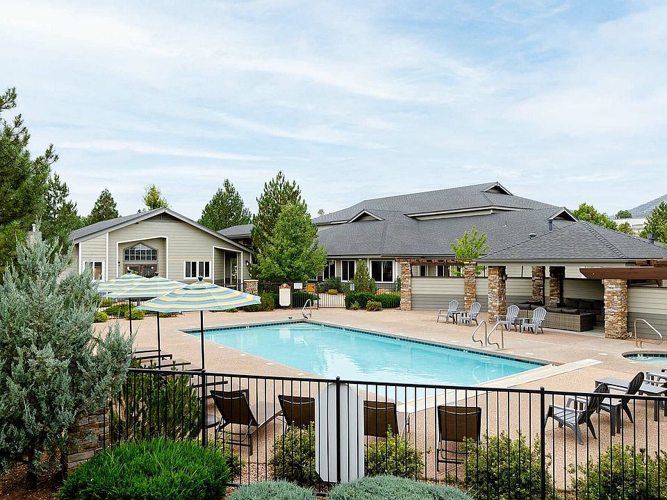 Relax by the peaceful poolside in this beautiful residential setting.