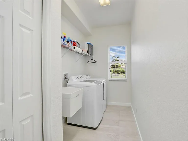 8845 Lely Island Cir — Photo 38