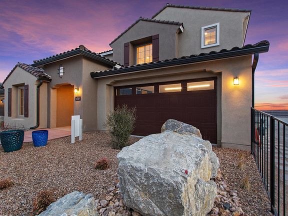 This home features 6 bedrooms, 4.5 baths, a den and a game room, and a 3-car tandem garage.