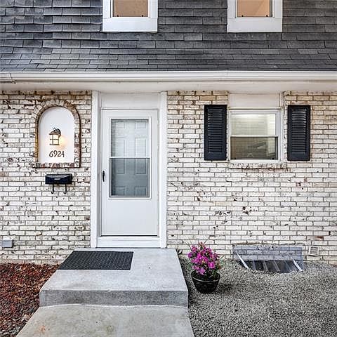 1st image of 6924 NW Chapel Woods Ln