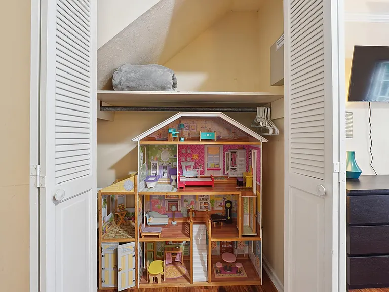 Doll house (no dolls) in closet Bedroom #4 Double Full size with TV -Main Level
