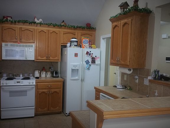Kitchen with Cathedral (12FT) Ceiling