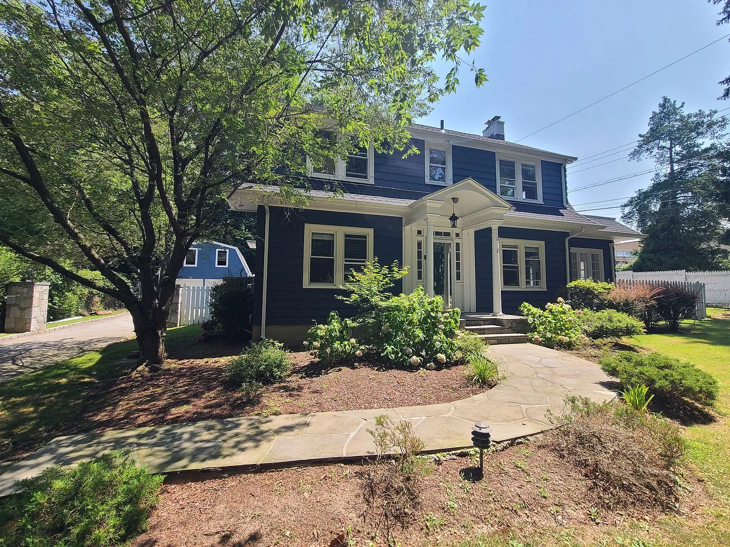 4 bedrooms and 1.5 bathrooms, this home offers generous space beyond expectation — Photo 1
