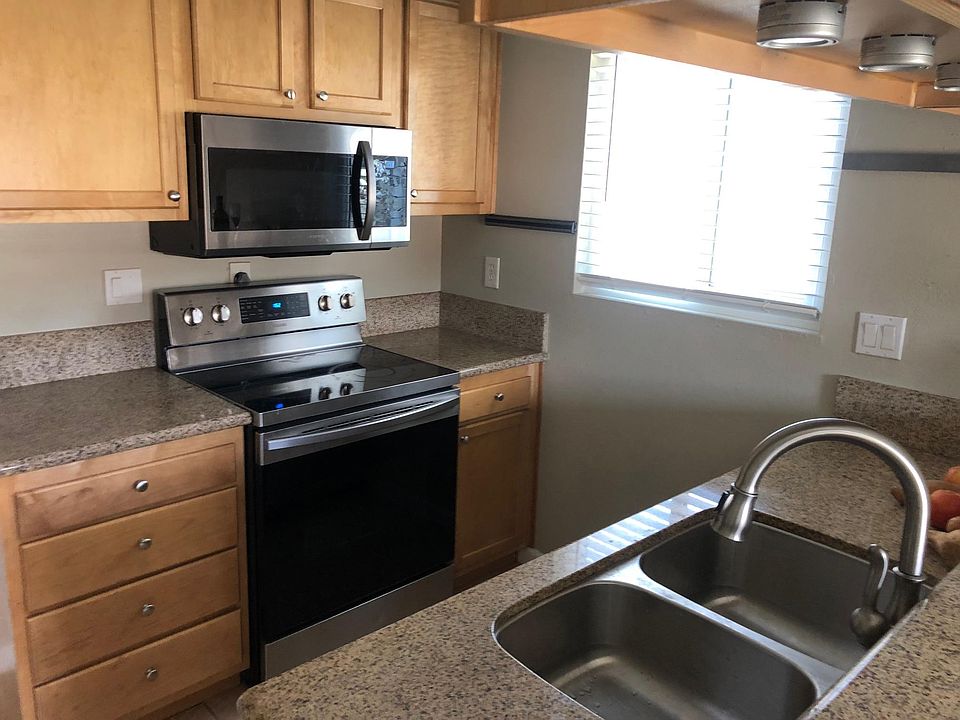 Kitchen, stainless steel appliances including dish washer