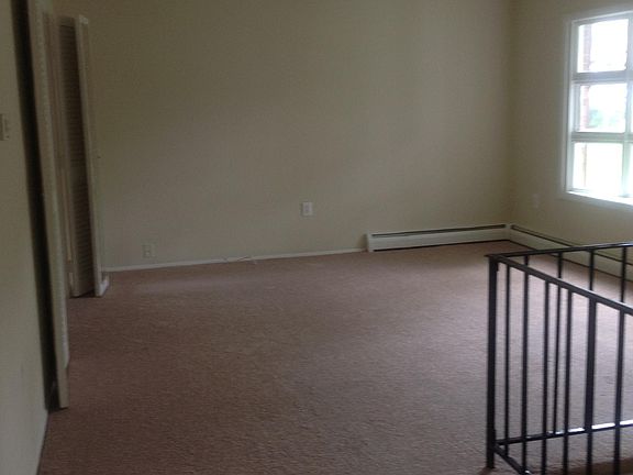 Living room view from top of entry steps and entry foyer.